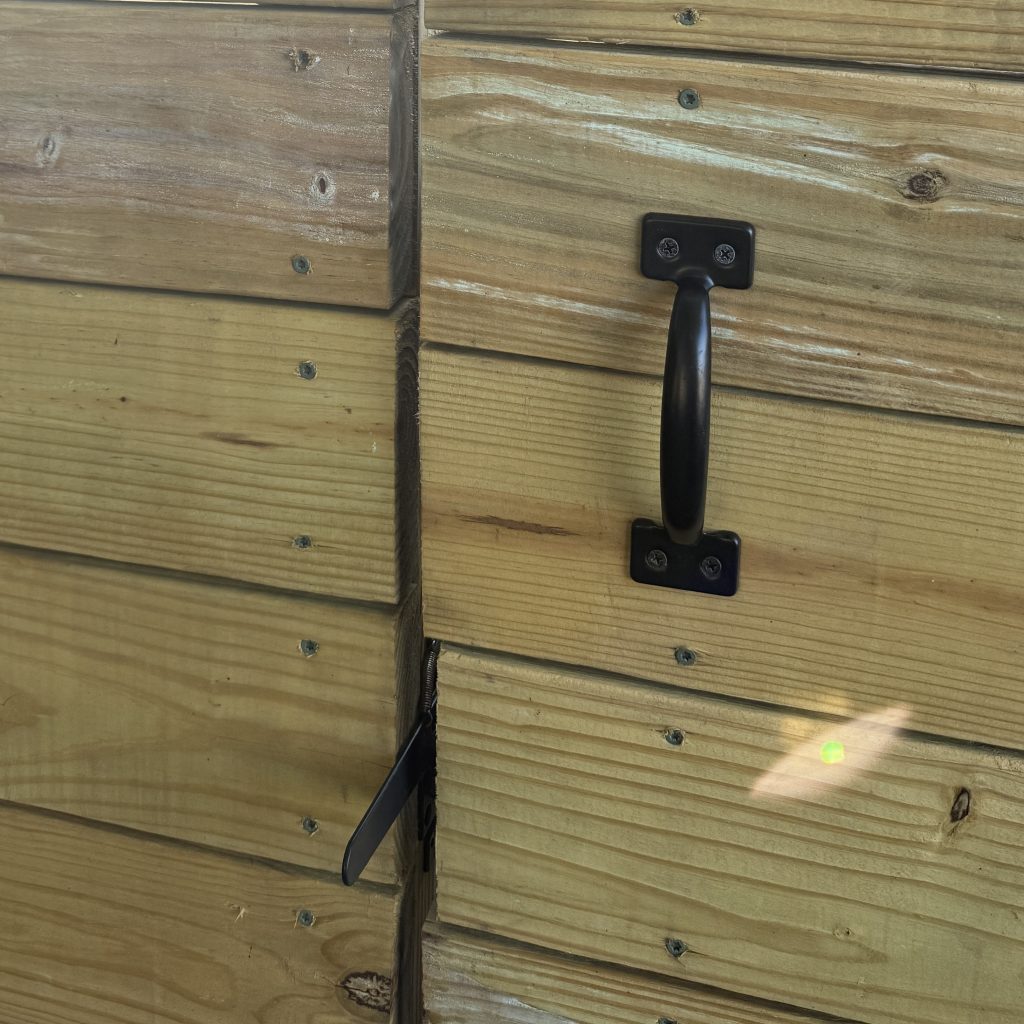 Photograph of a closed gate.